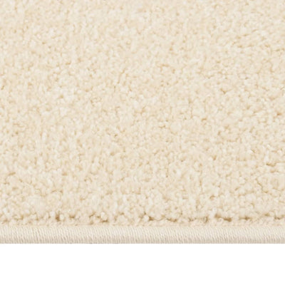 Vloerkleed kortpolig 80x150 cm crèmekleurig